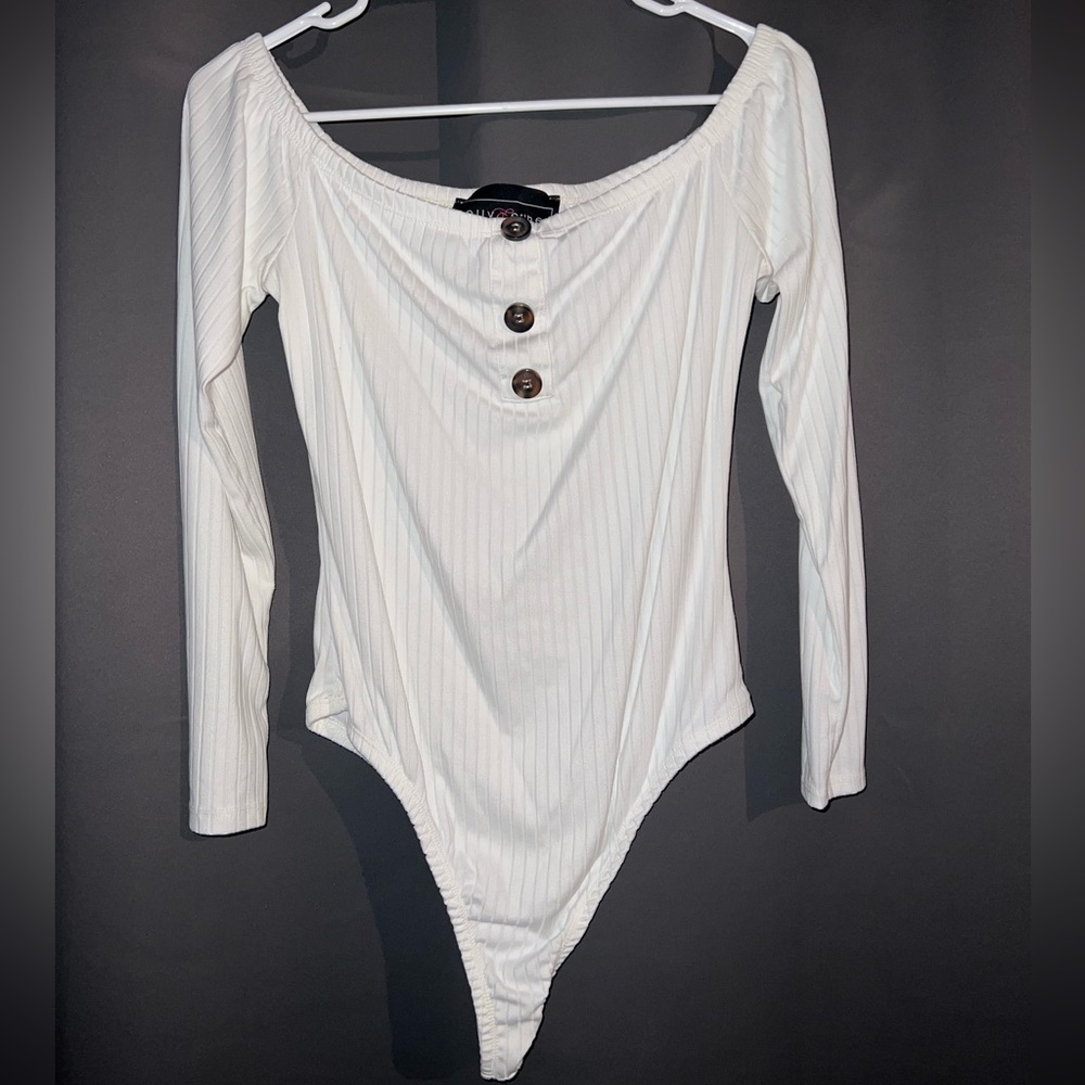 Cream colored body suit